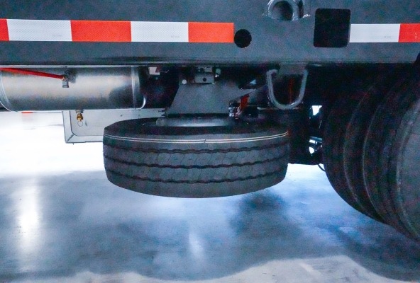 Spare tyres underneath the loading platform